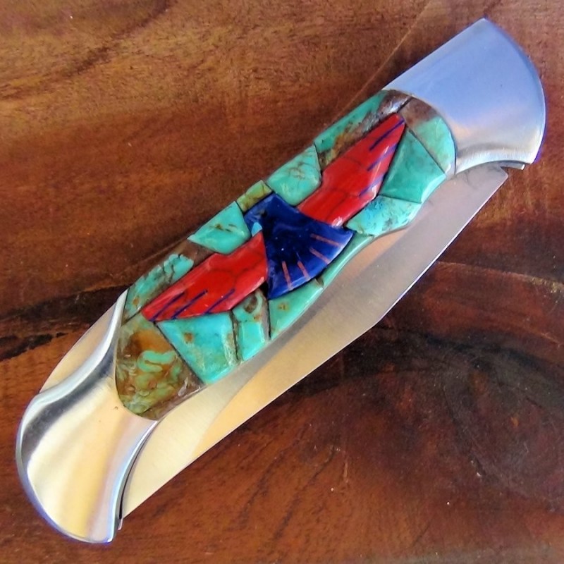 Coltello pieghevole Thunderbird sfondo turchese