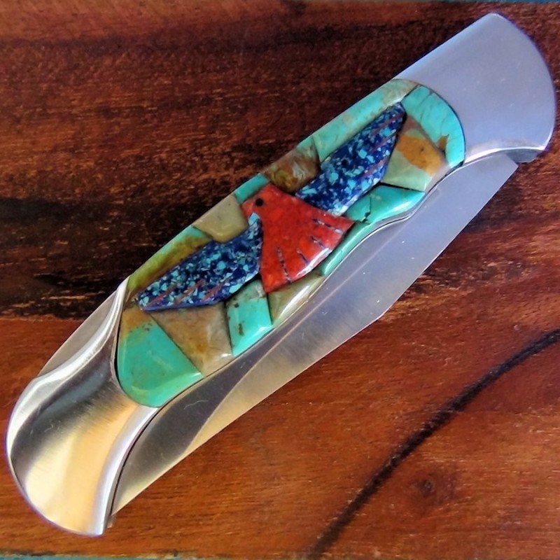 Coltello pieghevole Thunderbird sfondo turchese