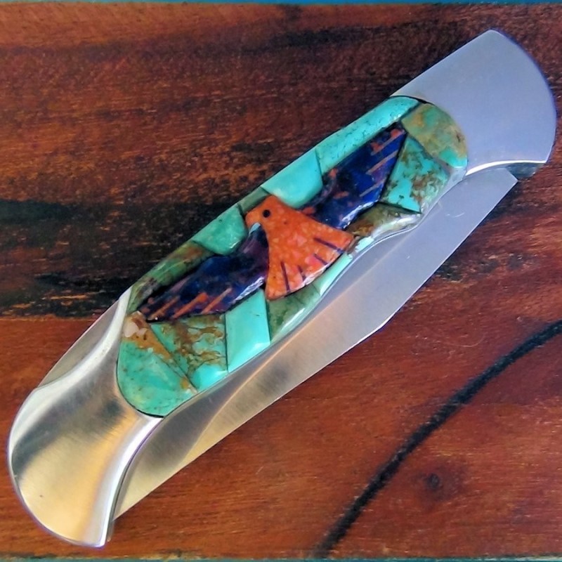 Coltello pieghevole Thunderbird sfondo turchese