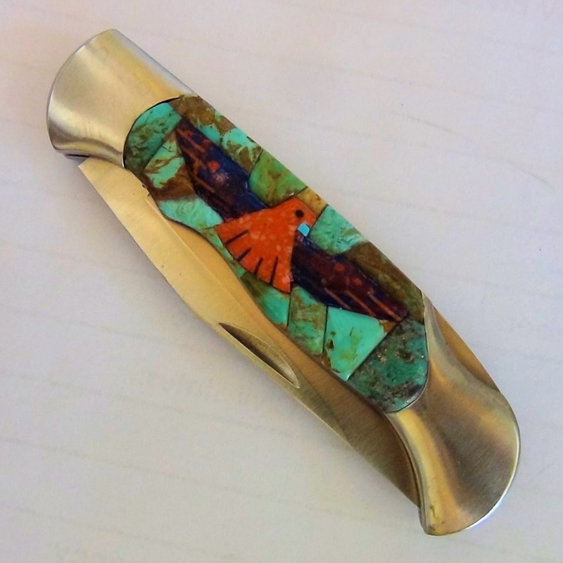Coltello pieghevole Thunderbird sfondo turchese