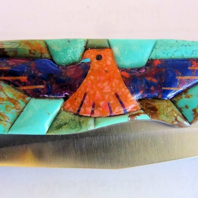 Coltello pieghevole Thunderbird sfondo turchese