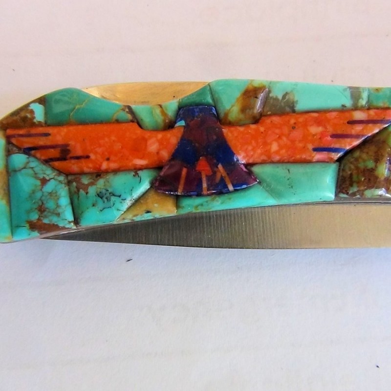 Coltello pieghevole Thunderbird sfondo turchese