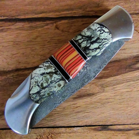 Serpentine Handle Folding...