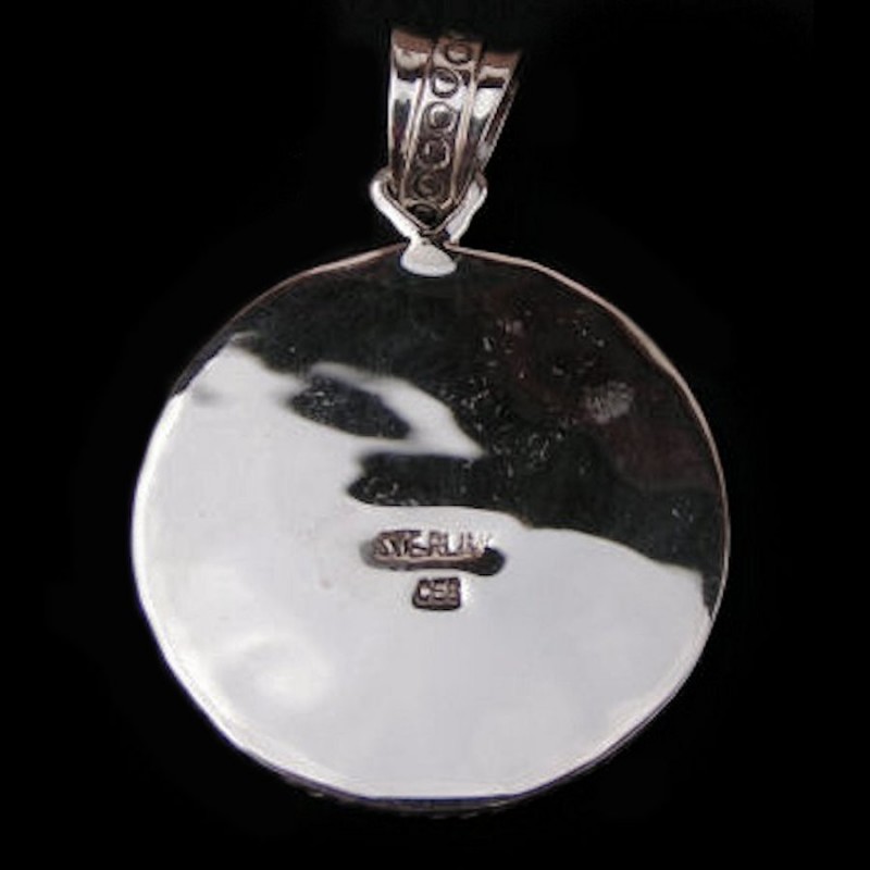 NAVAJO SYMBOL STERLING SILVER PENDANT