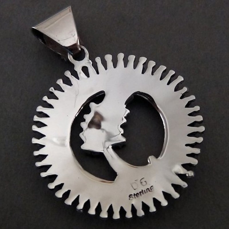 PENDENTIF PLUME ARGENT ET TURQUOISE PETITPOINT 